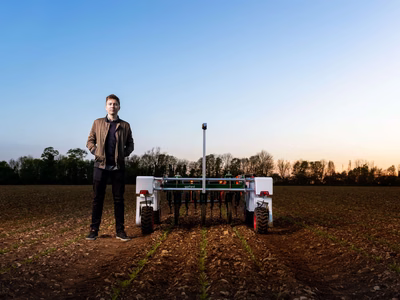 Man in the field with agriculture technology