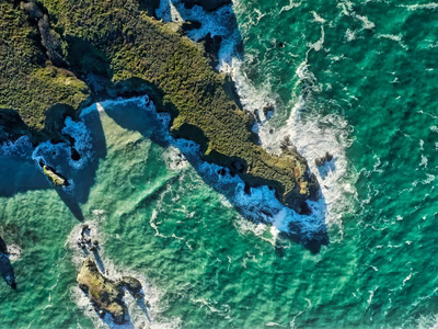 An aerial photograph of the coast and some cliffs